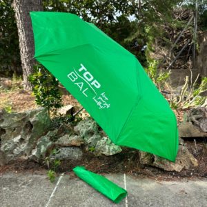 Paraguas verde plegable
